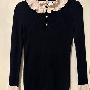 Sandro Black Ribbed Sweater with Cream Ruffle Collar